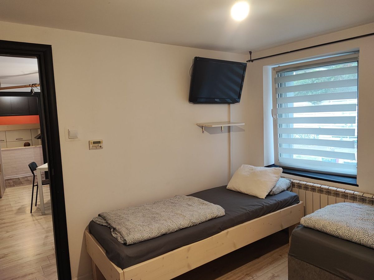 Sypialnia 2: łóżka od strony przedpokoju